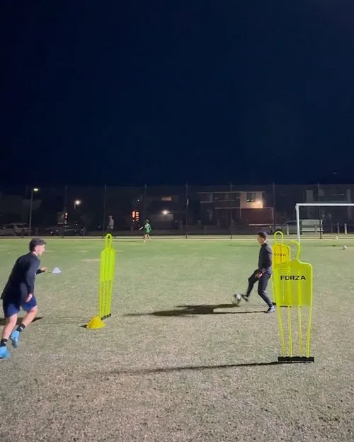 Coach Chris working with a senior player on advanced technique